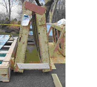 Photo 1 (courtesy of OSHA). The first A-frame that was set up by the workers. The smaller crate supported by the two wooden bars is on the right