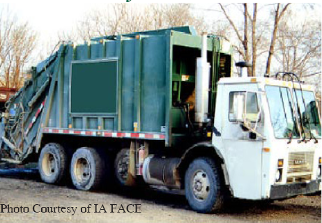 A 21-year-old sanitation worker was riding on 